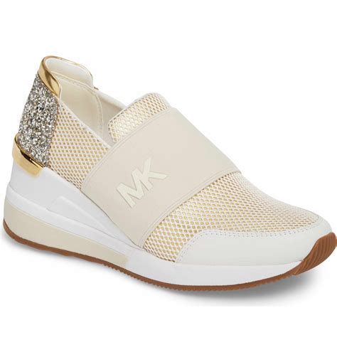 michael kors rose gold slip on logo|michael kors rose gold trainers.